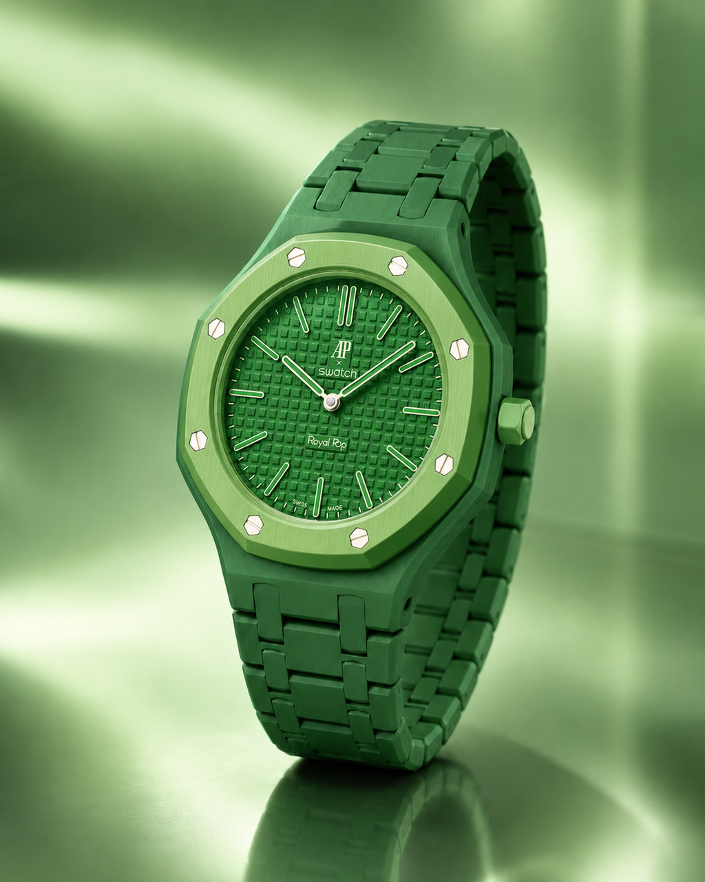 Green watch with a textured face on a green background