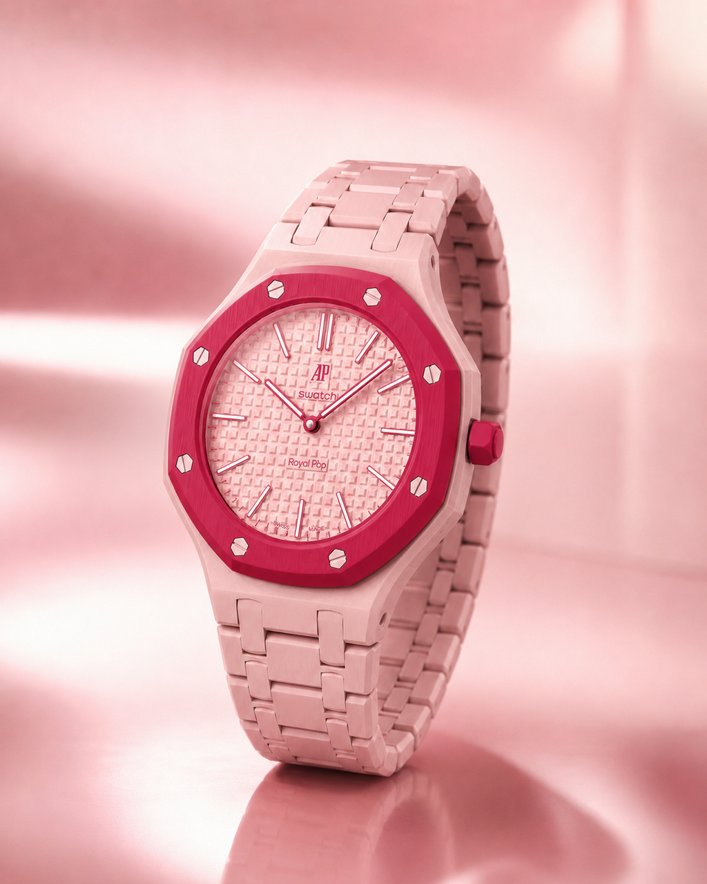 Pink watch with a matching strap on a pink background
