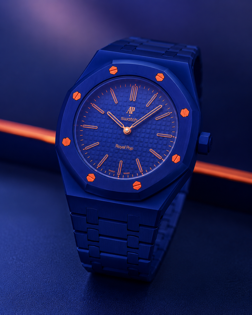 Blue watch with orange accents on a dark background